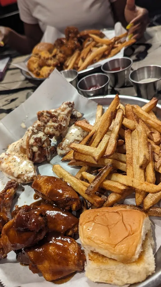 Akron Jerk Zesty Rain Garlic Parmesan and Too Much Sauce